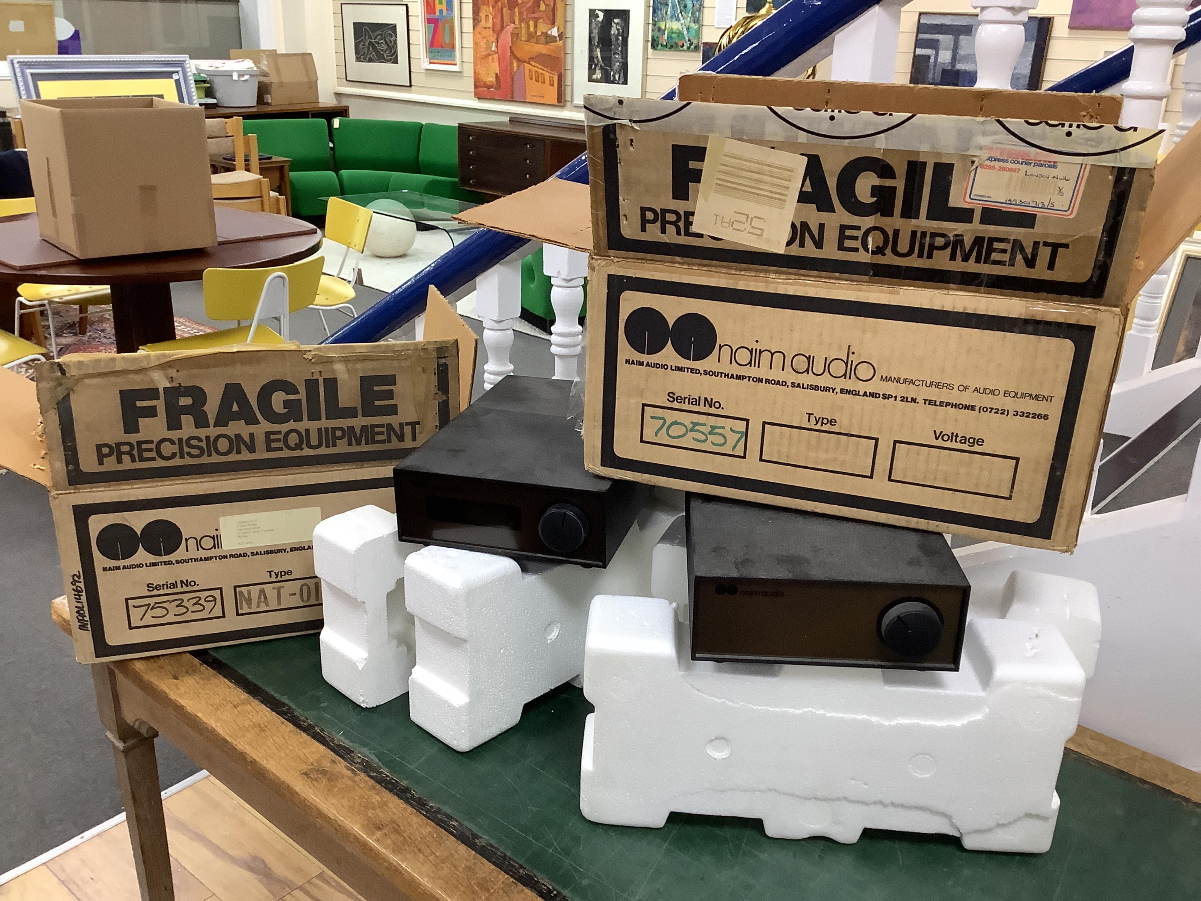 Seven Naim Audio hi-fi separates in original card boxes; a Niam HiCap DR power supply unit, serial number 70557, a Niam NAP 250 power amplifier, serial number 88778, a Niam NAT 02 FM Tuner, serial number 75339, a Niam NA